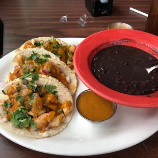 Chicken street tacos with black beans.