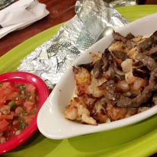 Sky Surf and Turf dip super good. But it said $11 on the menu and I got charged $15. They're lucky I liked it