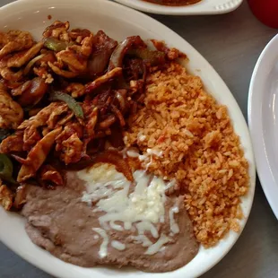 Lunch portion chicken fajitas.