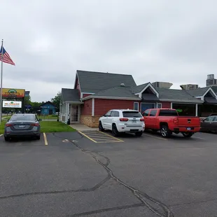 several cars parked in a parking lot