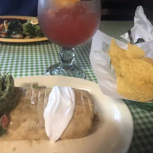 My chimichanga and strawberry margarita. With chips