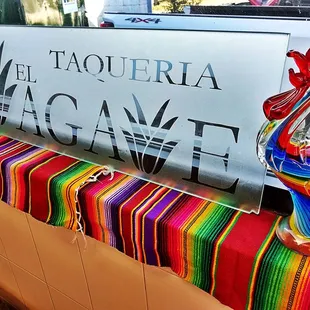 a table with a colorful table cloth