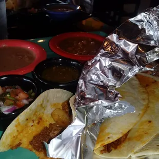 Started eating b4 remembering to takt this pix!! Tacos Al Pastor :)