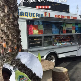 Store front taco truck in the parking lot