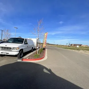 a delivery truck parked in a parking lot