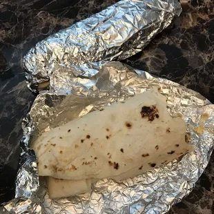 a tortilla wrapped in foil