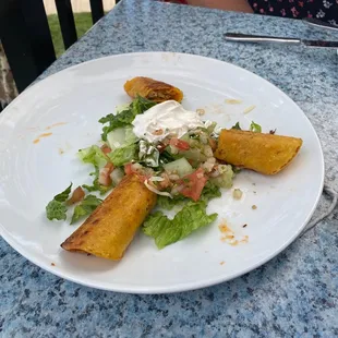 Half the taquito plate - we already ate the other half!