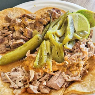 Carne asada and carnitas tacos (No onion)