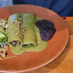 Duck enchiladas with mole Verde sauce