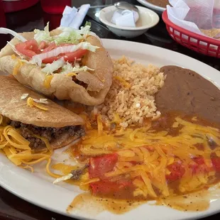 Mexican plate with puffy taco and crispy taco