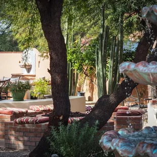 Courtyard with 2 fountains and verdant greenery