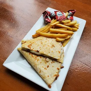 Kids quesadilla with fries. My picky eater likes this with the black beans and rice.