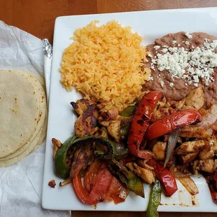 Chicken Fajitas, rice, beans and tortillas