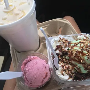 two ice cream sundaes and a milkshake