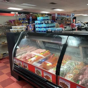a deli case filled with meat