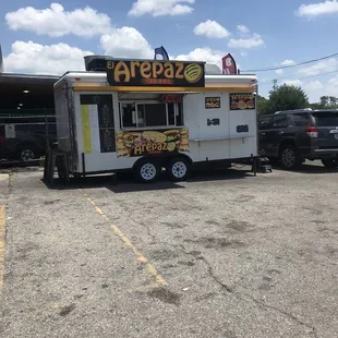 a food truck in a parking lot