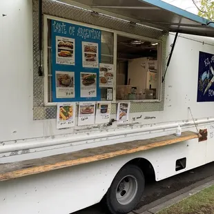 a food truck parked on the side of the road