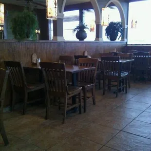 a restaurant with tables and chairs