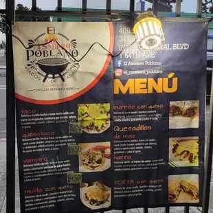 a menu on a fence