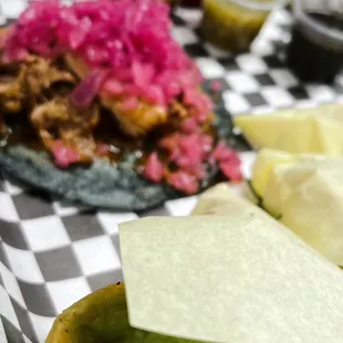 Cochinita taco blue corn tortilla.