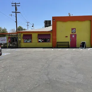 The entrance is the red door.