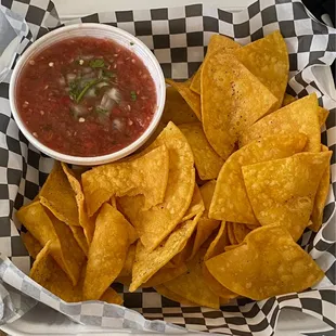 Fresh homemade chips and salsa that salsa will burn your ass but i didn't care Lol it was so good! Also the lil taco sauces are incredible!