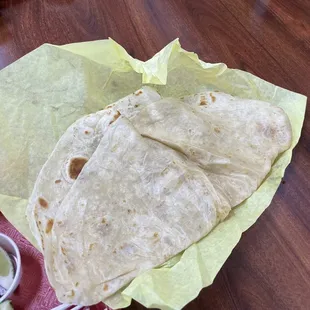 One huge flour tortilla