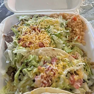 Combination plate with taco enchilada and tostada