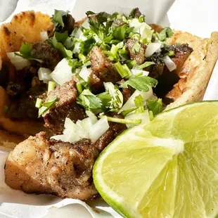 a taco with a lime slice