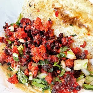 a tortilla with meat and vegetables