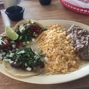 Lunch taco plate! Two al pastor and one barbacoa