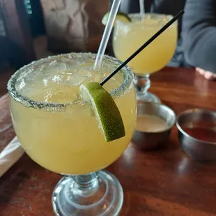 two margaritas on a table