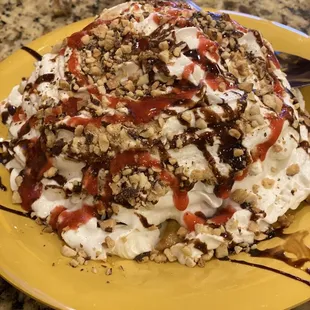 a desert on a yellow plate