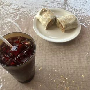 a plate of food and a drink