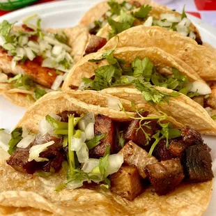three tacos on a plate