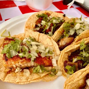 three tacos on a plate