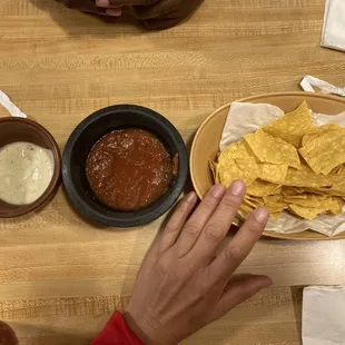 Complimentary chips and red &amp; white salsas