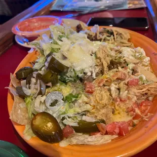 This is what a plate of nachos looks like......and purchase your cheese because it doesn&apos;t come with any!