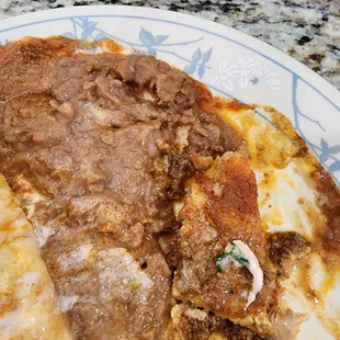 Part of the runny greasy plate we could not finish