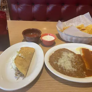 Speedy Gonzales chicken taco, cheese enchilada with red sauce and refried beans.