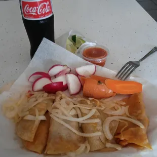 Tacos de Canasta ( chorizo con papa y chicharron) you should really try the chicharron they're delicious.