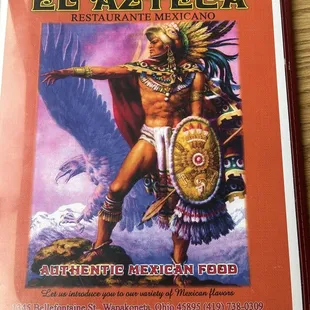 a man in a costume holding a shield