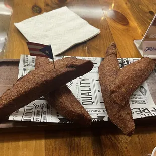 two pieces of bread on a tray