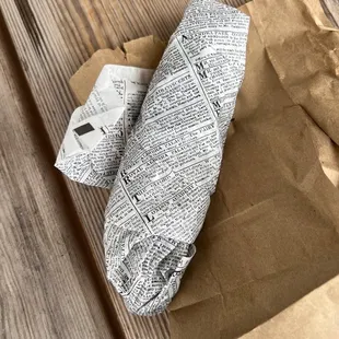 a piece of paper on a wooden table