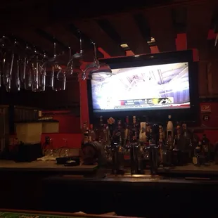 The bar. Big screen tv.