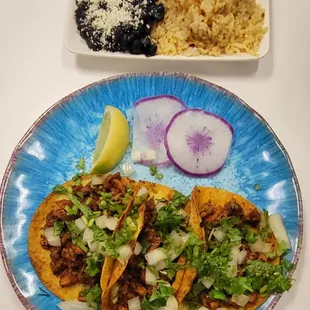 (3) Taco plate, I got the chicken. The plate comes with black beans &amp; Spanish Rice, A good deal as the plate was just ($15.00)