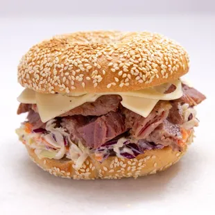 a sandwich with meat and cheese
