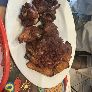 Carne frita, amarillos y arroz con habichuela