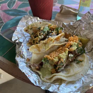 Pastor taco with rice and pork belly taco with rice