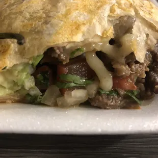 a close up of a burrito